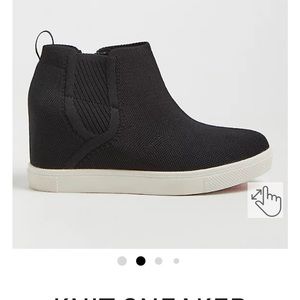 Black torrid wedge. Worn for 2 hours and just wasn't for me!